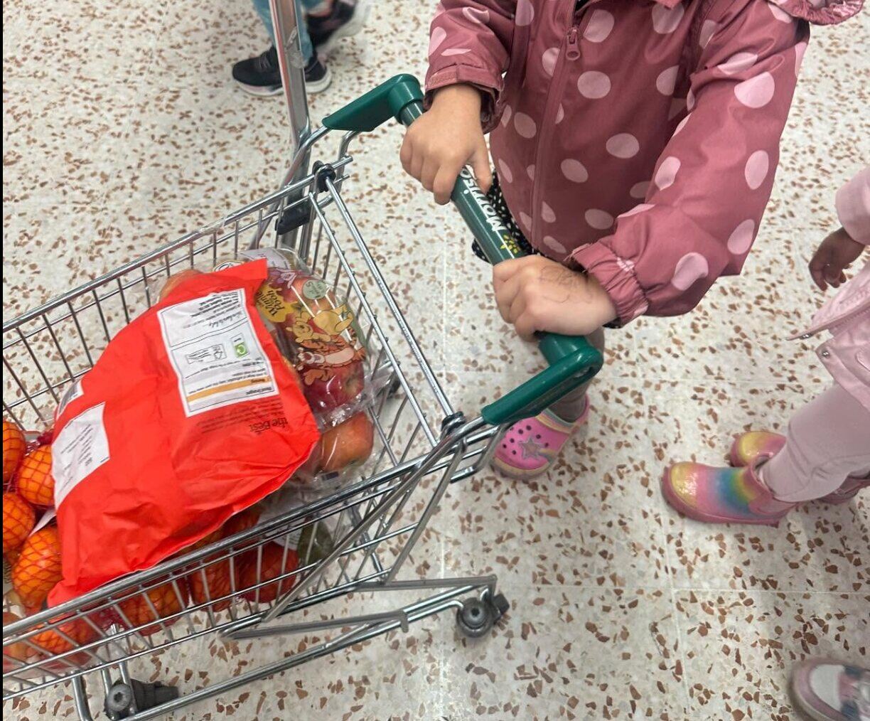 Children choosing ingredients during a food activity