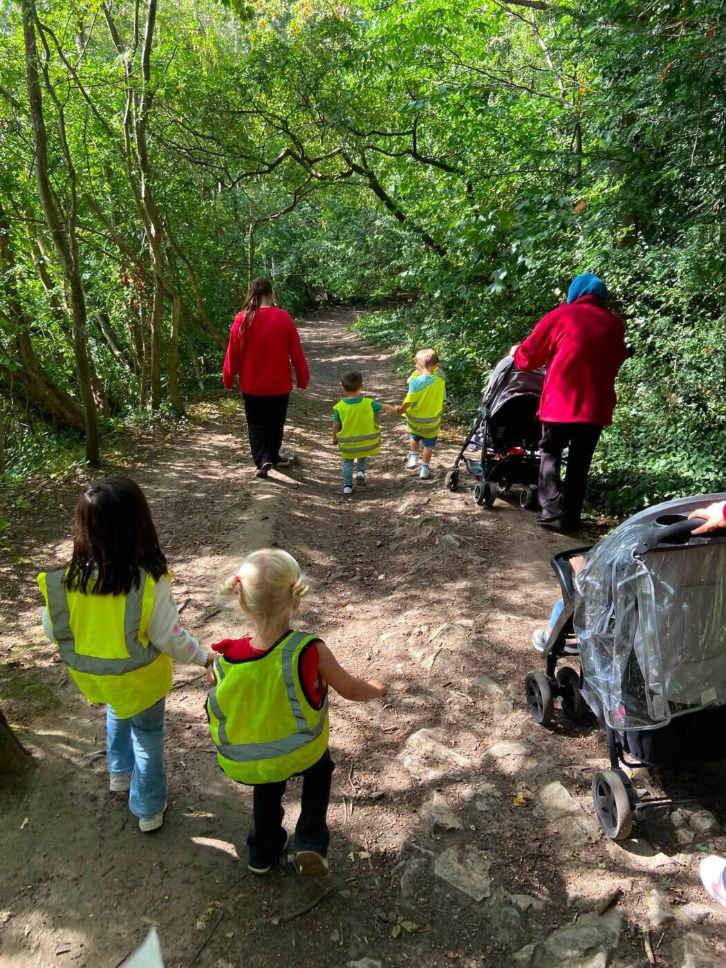 Gilmerton children creating fairy houses in the forest