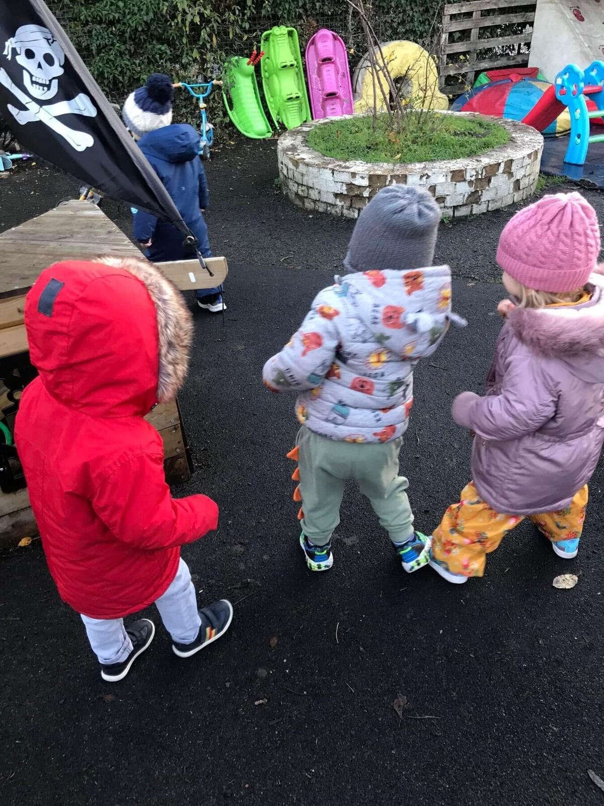 Children enjoying outdoor imaginative play